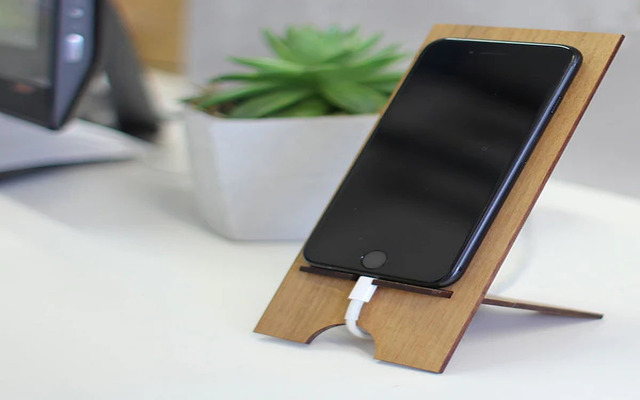 A wooden phone stand