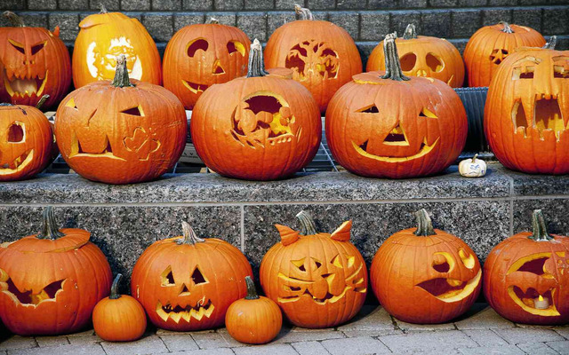 Why do we carve pumpkins at Halloween?